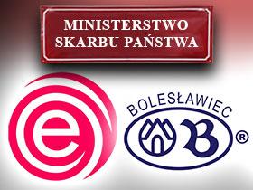 Tabliczka z napisem Ministerstwo Skarbu Państwa poniżej logo Eurlot i Zakładów Ceramicznymi Bolesławiec
