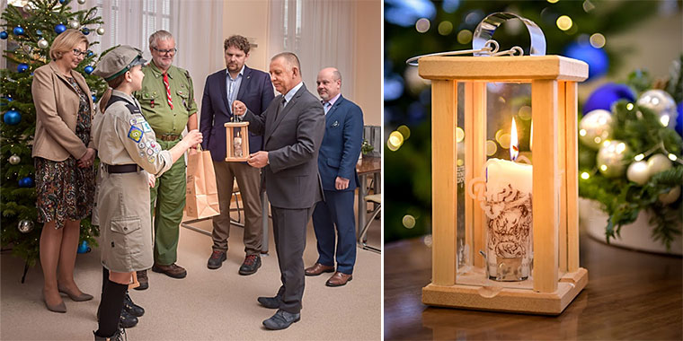 Prezes NIK odbiera Światełko Pokoju z&nbsp;rąk harcerzy, obok lampion Światełka Pokoju