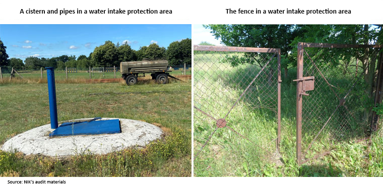 A cistern, pipes and the fence in a water intake protection area